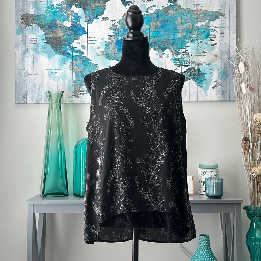 Black shirt with no sleeves with flowery design. Worthington.
